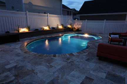 Enjoy a tranquil evening by this elegant 10?foot fiberglass pool, set in a cozy backyard oasis that radiates relaxed luxury.