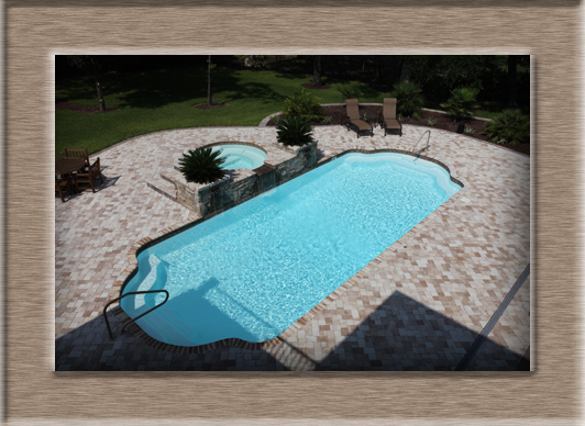 Experience the serene clarity of our fiberglass pool, set against a sunlit backyard patio—perfect for leisurely dips and tranquil weekends.
