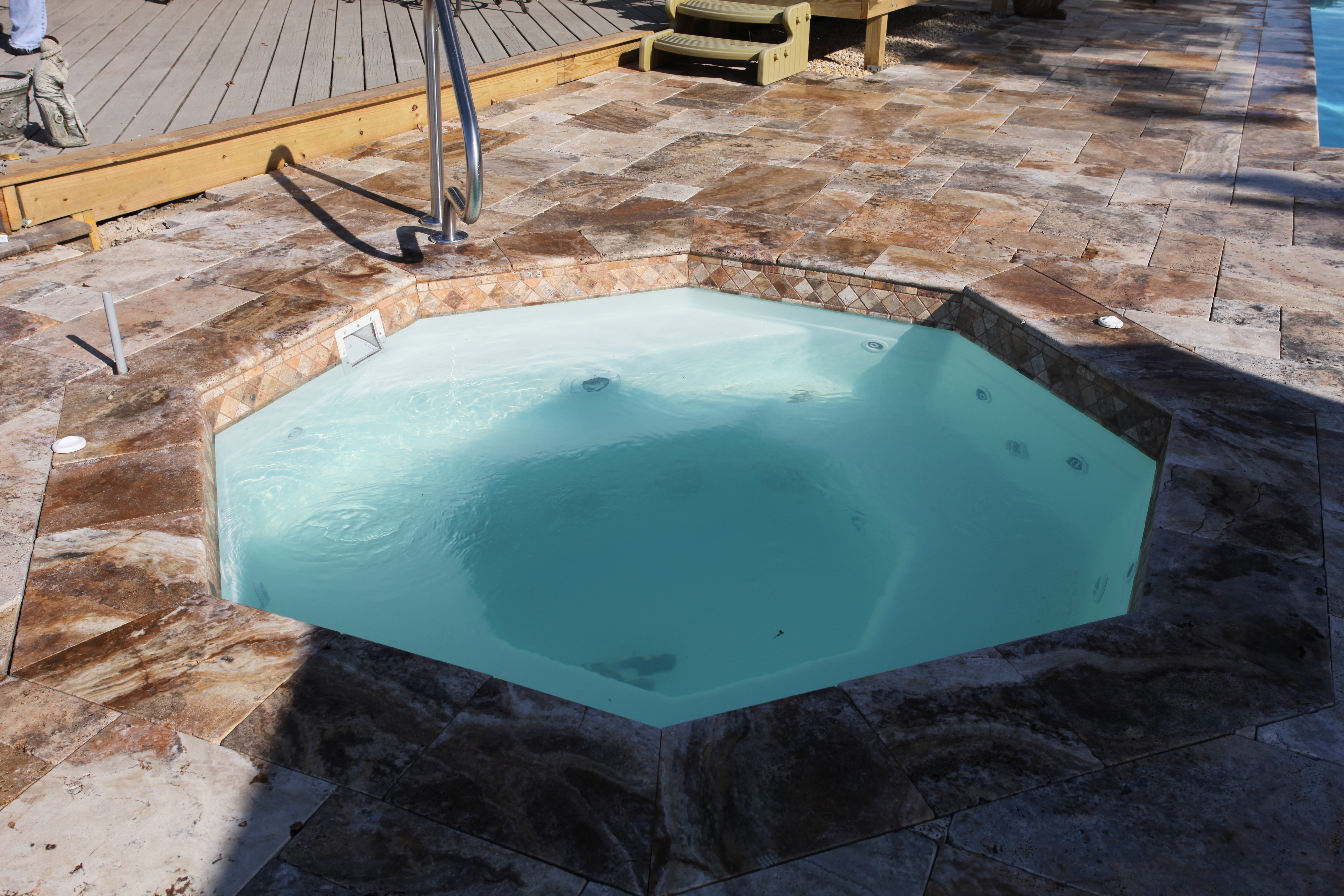 Experience serene relaxation with San Juan’s fiberglass hot tub, set in a sun-kissed backyard oasis.