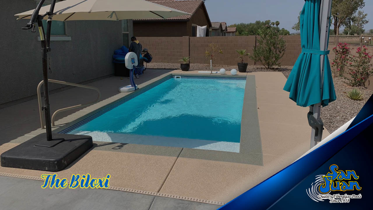 Enjoy crystal-clear turquoise waters in San Juan’s fiberglass “Biloxi” pool, the perfect backyard retreat for sunny summer days.