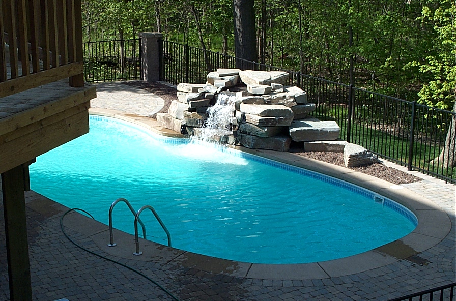 Enjoy crystal-clear, fiberglass perfection in your own backyard oasis—perfect for sunny summer days.