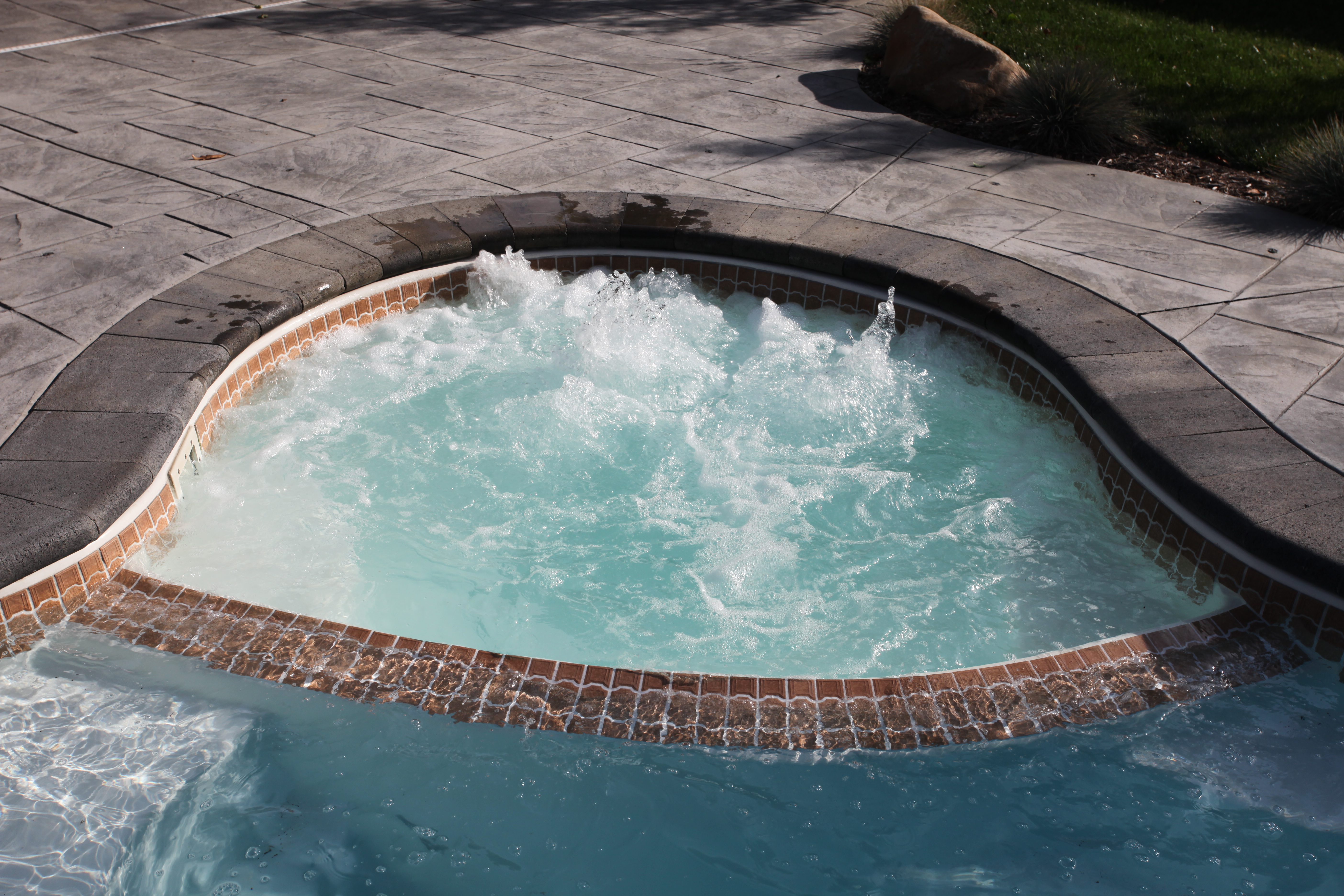 Experience the epitome of luxury with this stunning inground pool, perfectly integrated into a serene backyard oasis. The modern design and resort-style ambiance create a relaxing atmosphere, perfect for warm weather and outdoor living.