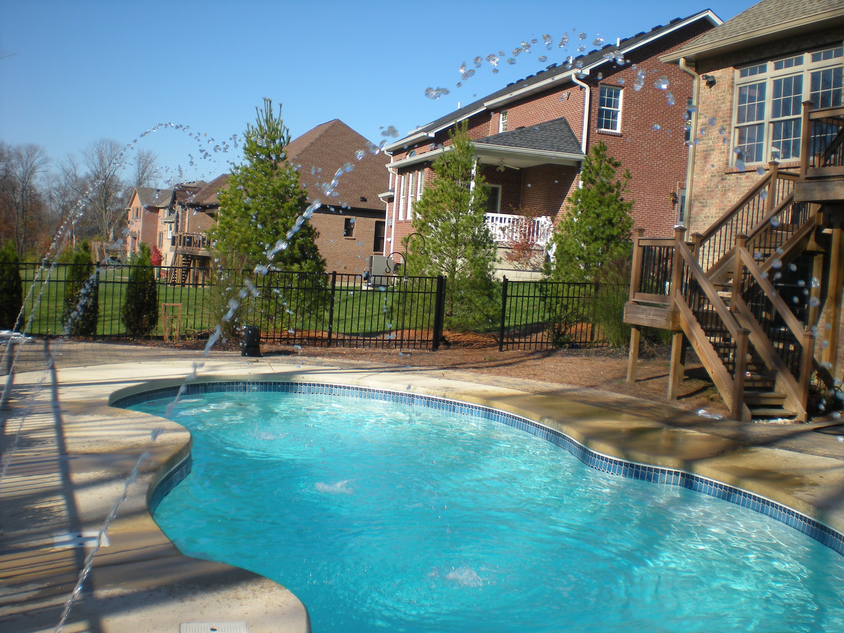 Experience tranquil backyard luxury with San Juan’s bright-blue fiberglass pool, the perfect centerpiece for sun-filled relaxation.